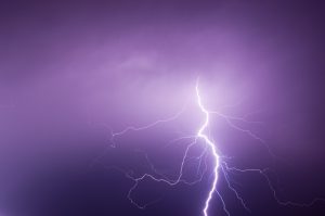 bolt of light cutting night sky