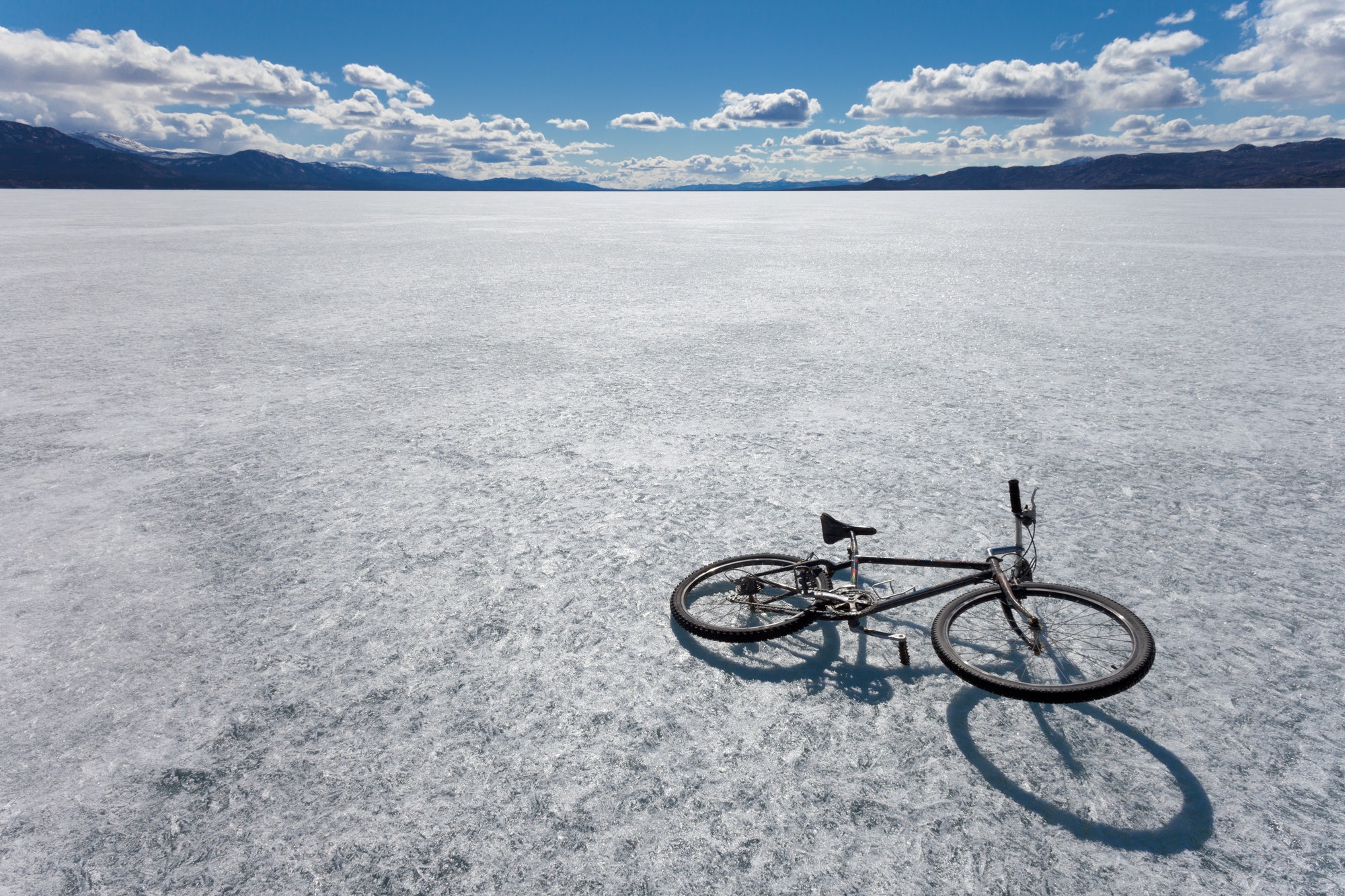 Ice bicycle frozen Lake Laberge Yukon Canada