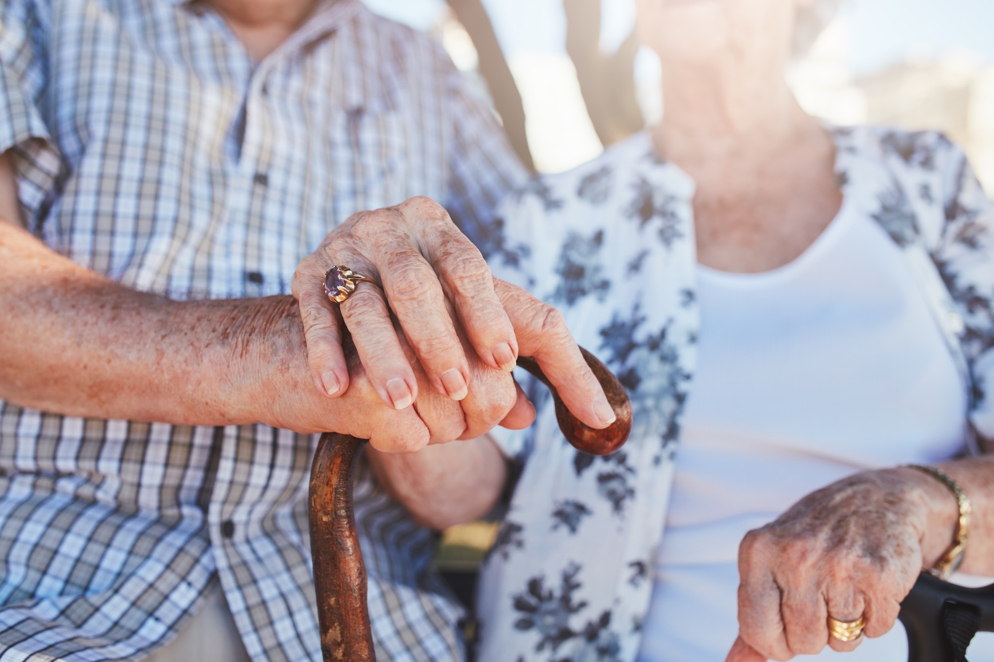 Senior couple holding hands
