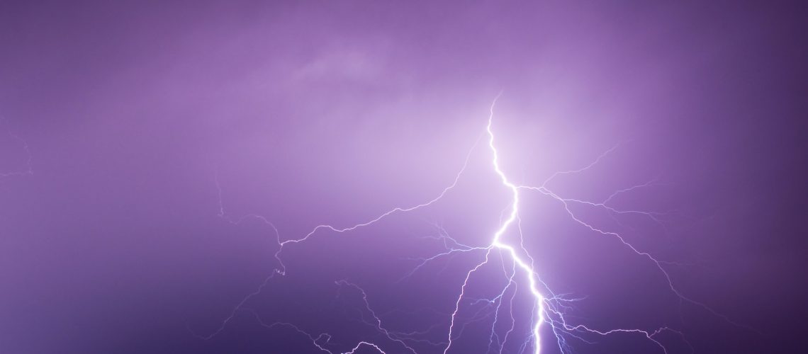bolt of light cutting night sky