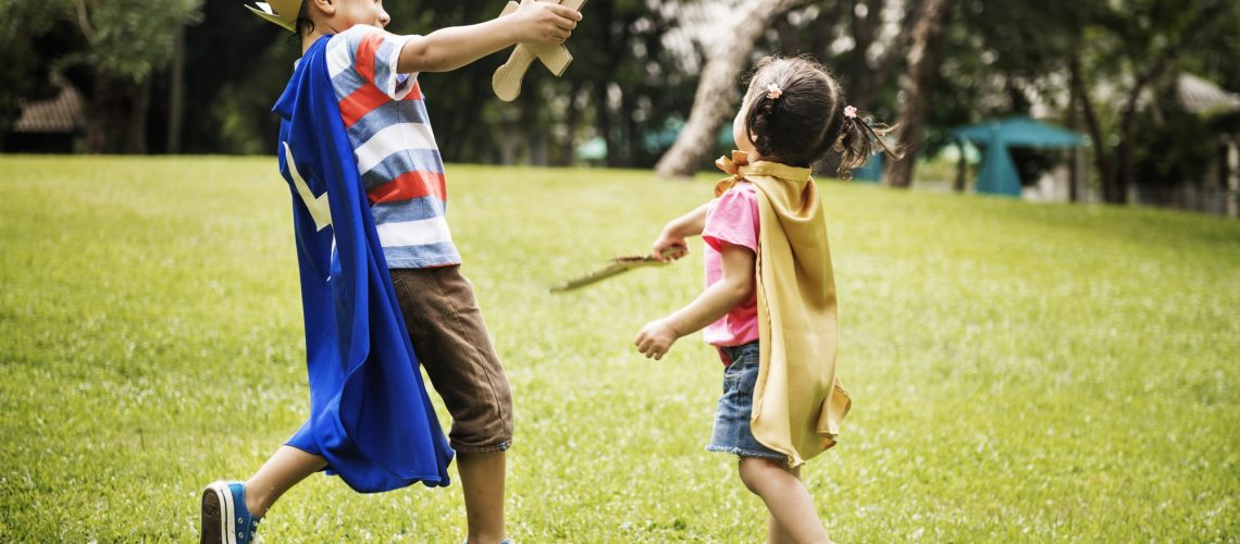 Siblings Playful Dressup Park Concept