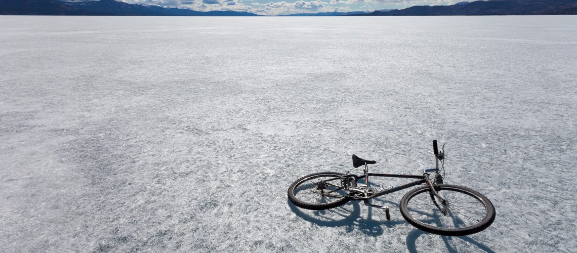 Ice bicycle frozen Lake Laberge Yukon Canada